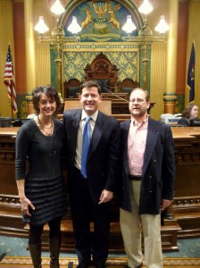 Debi Hollis, President, Representative Jim Townsend and Russell Levine, Vice-President in the Michigan House chamber.